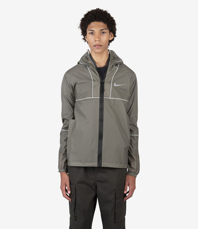 Shop Nike iSPA Lightweight Packable Jacket Light Army/Black at itk ...