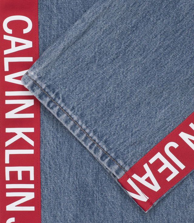 Shop Calvin Klein Jeans CKJ 035 Straight Iconic Mid Stone Side Stripe at itk online store