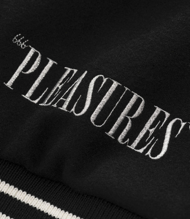 Shop Pleasures x UNKLE Mo' Wax Varsity Jacket Black/White at